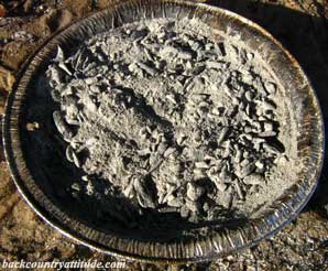 white ashes in fire pan