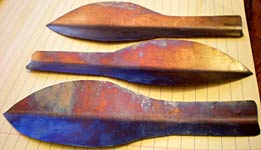 3 finished titanium trowels